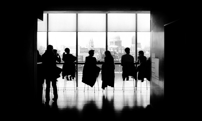 people in front of a window